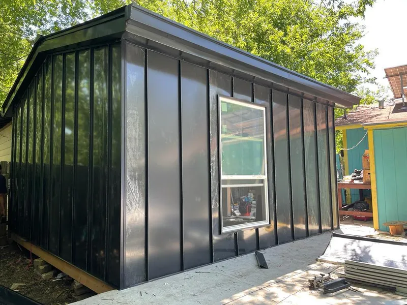 Black standing seam metal wall panels for Metal Roof Installation in Paramount