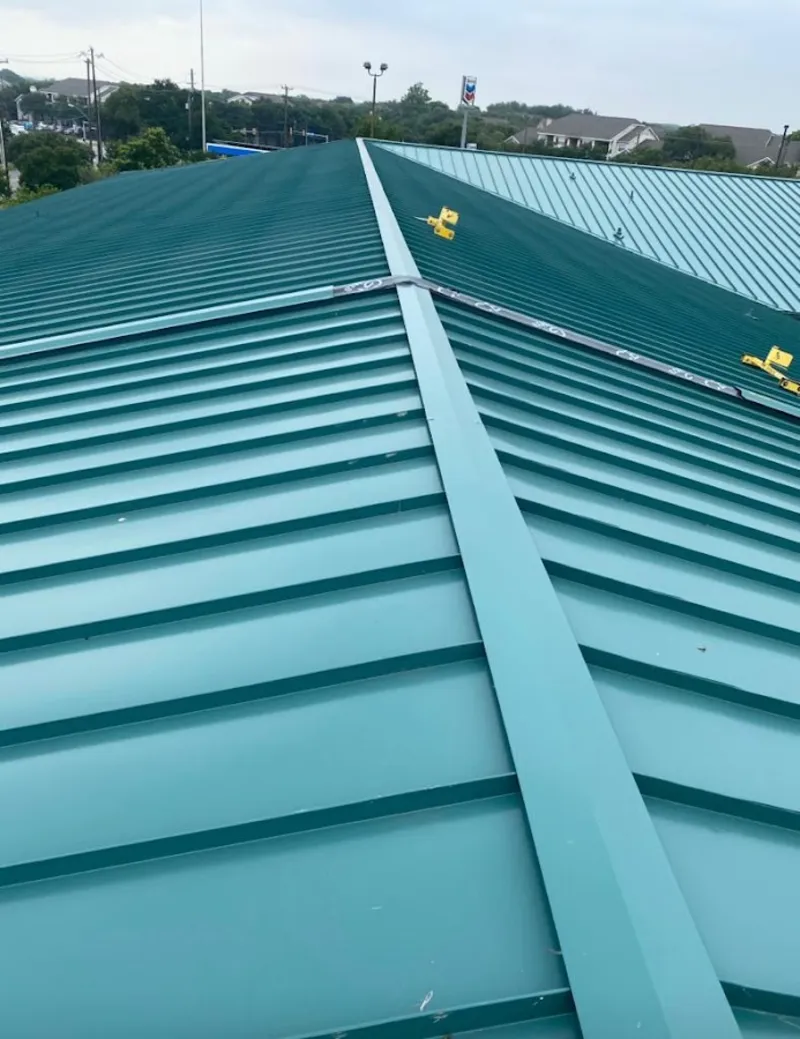 Green commercial metal roof ridge and valley for Metal Roof Repair in Paramount